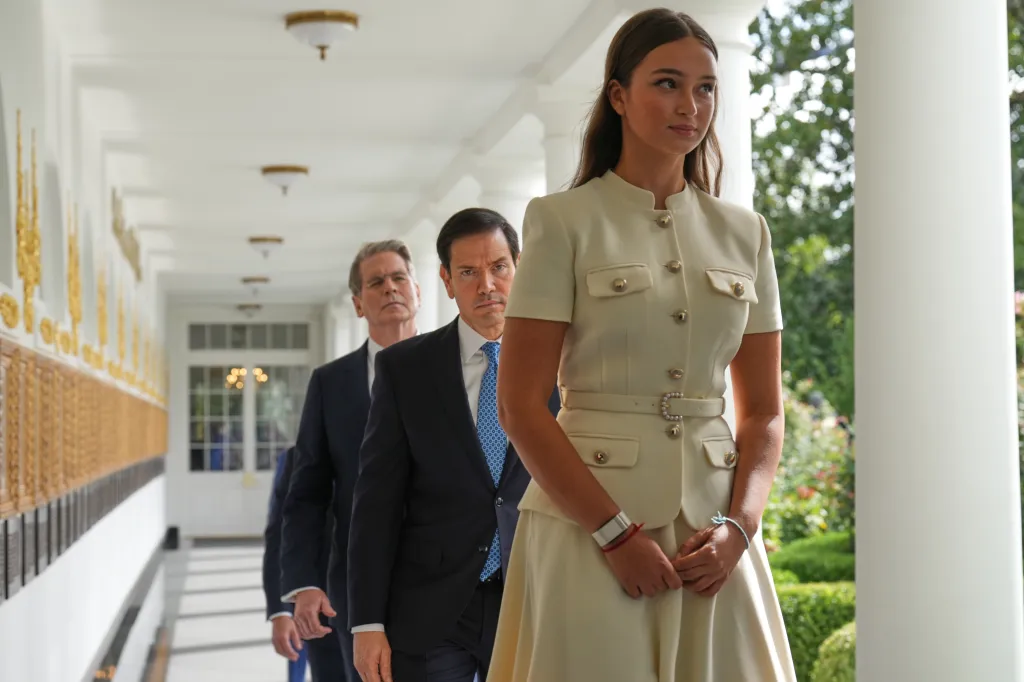 Arabella Kushner, Marco Rubio, and Scott Bessent walking along the Colonnade at the White House.