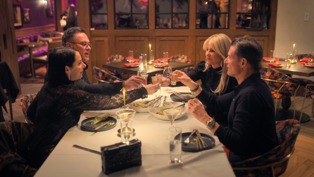 Ashley Earle, Thomas TJ Earle, Alisa Earle, and Todd in a scene from 