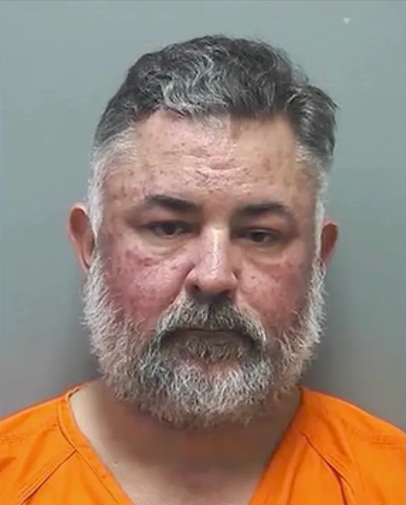 Mugshot of Atlanta police Detective Ronald Sluss.