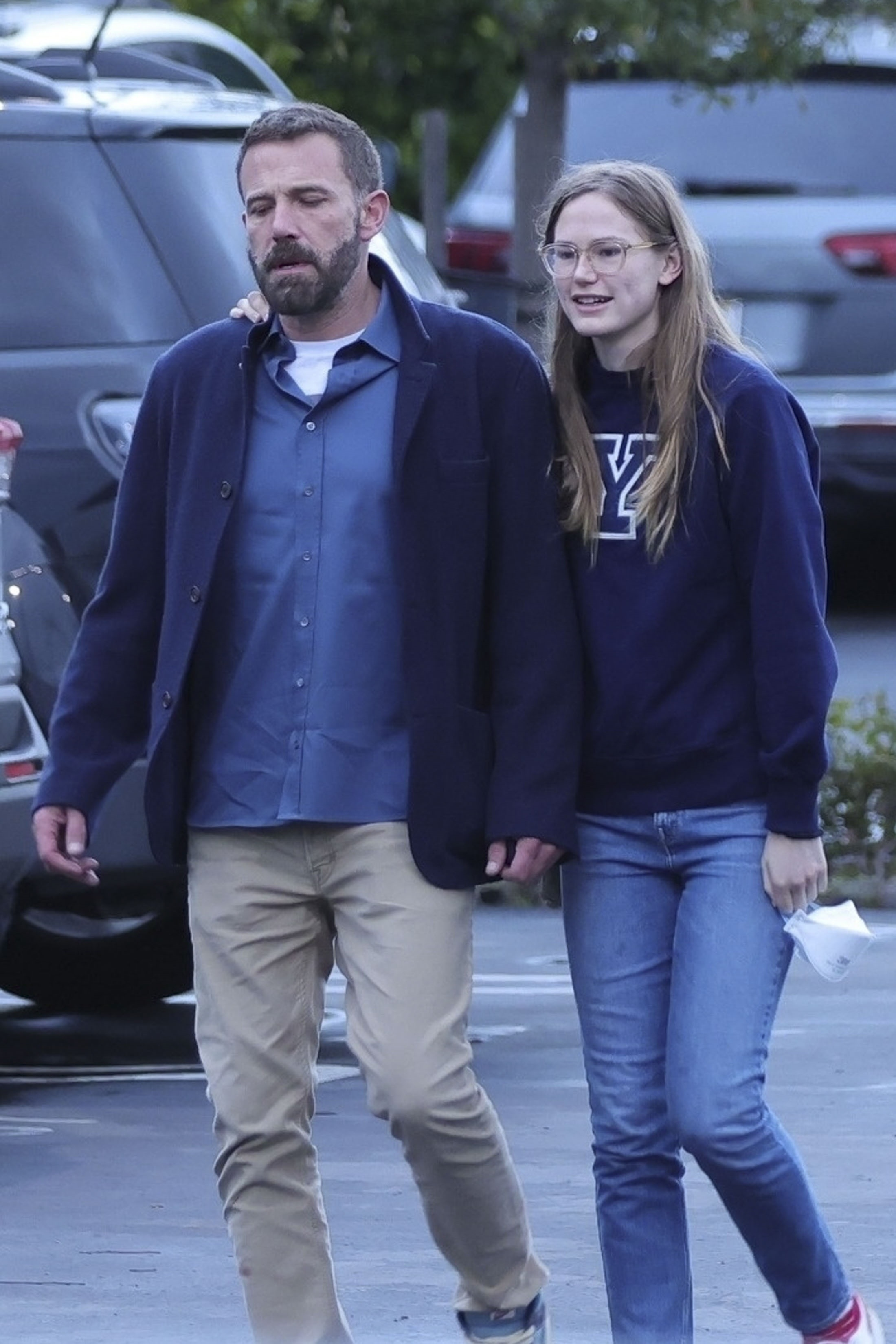 Ben Affleck with his arm around his daughter Violet Affleck.