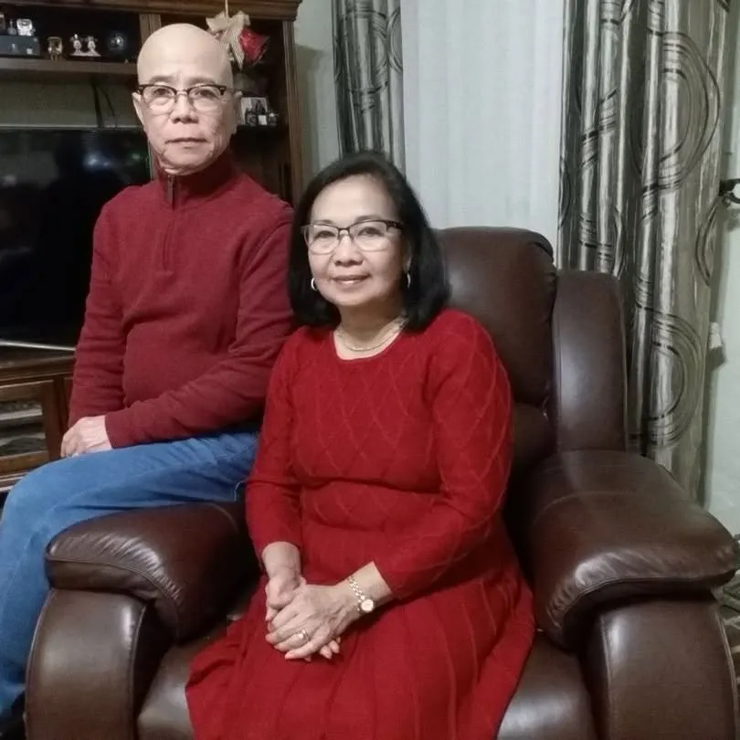 Josephine Atienza and her husband Bert Atienza pose for a photo.