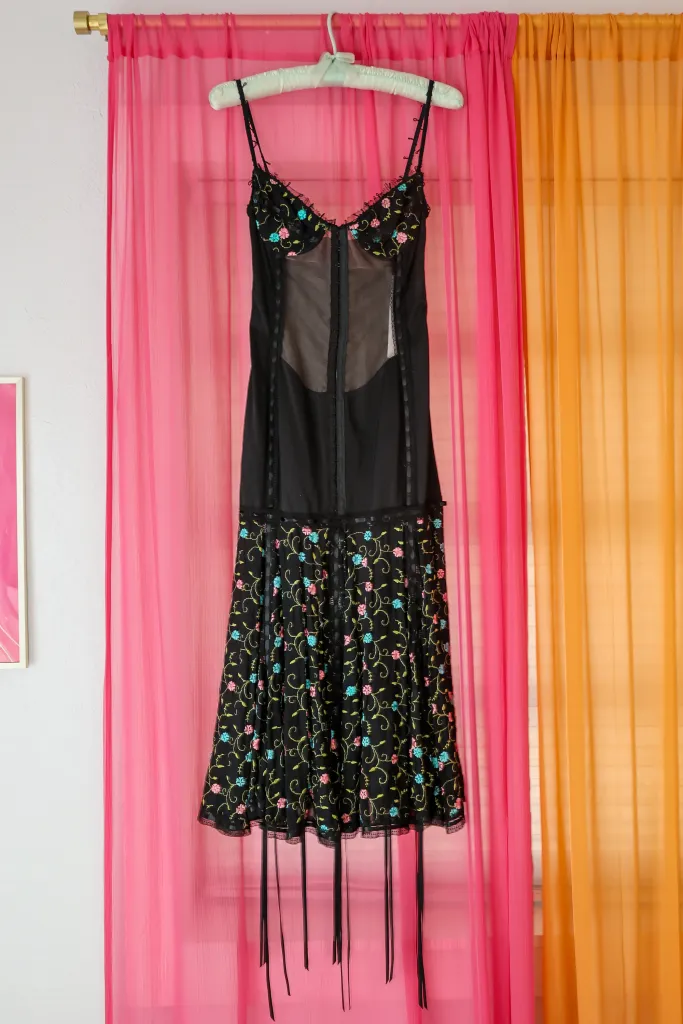 Black Betsey Johnson dress with floral embroidery.