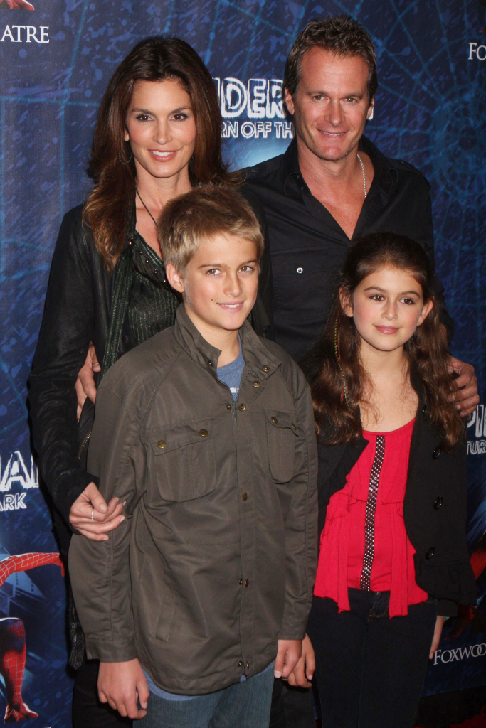 Cindy Crawford, Rande Gerber, and their children, Presley Walker Gerber and Kaia Gerber, pose for a family photo.