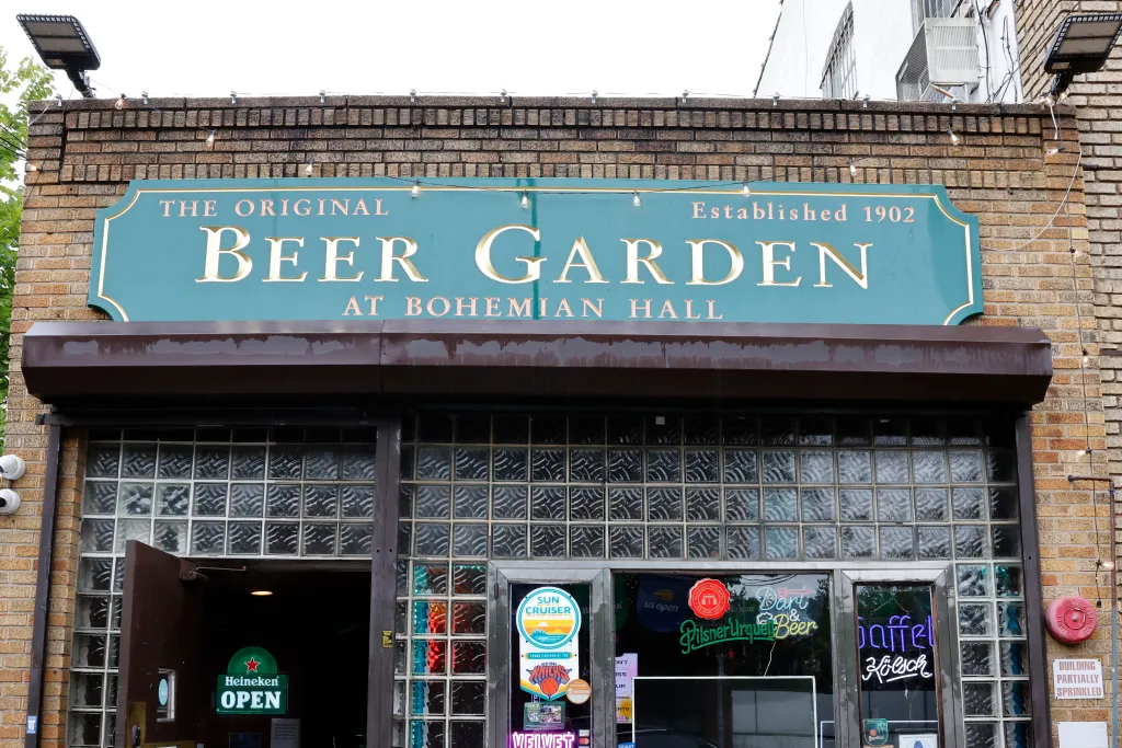 The exterior of Bohemian Hall & Beer Garden in Queens, with its sign reading 