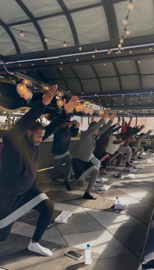 Participants taking part in a Bro-lates pilates class.