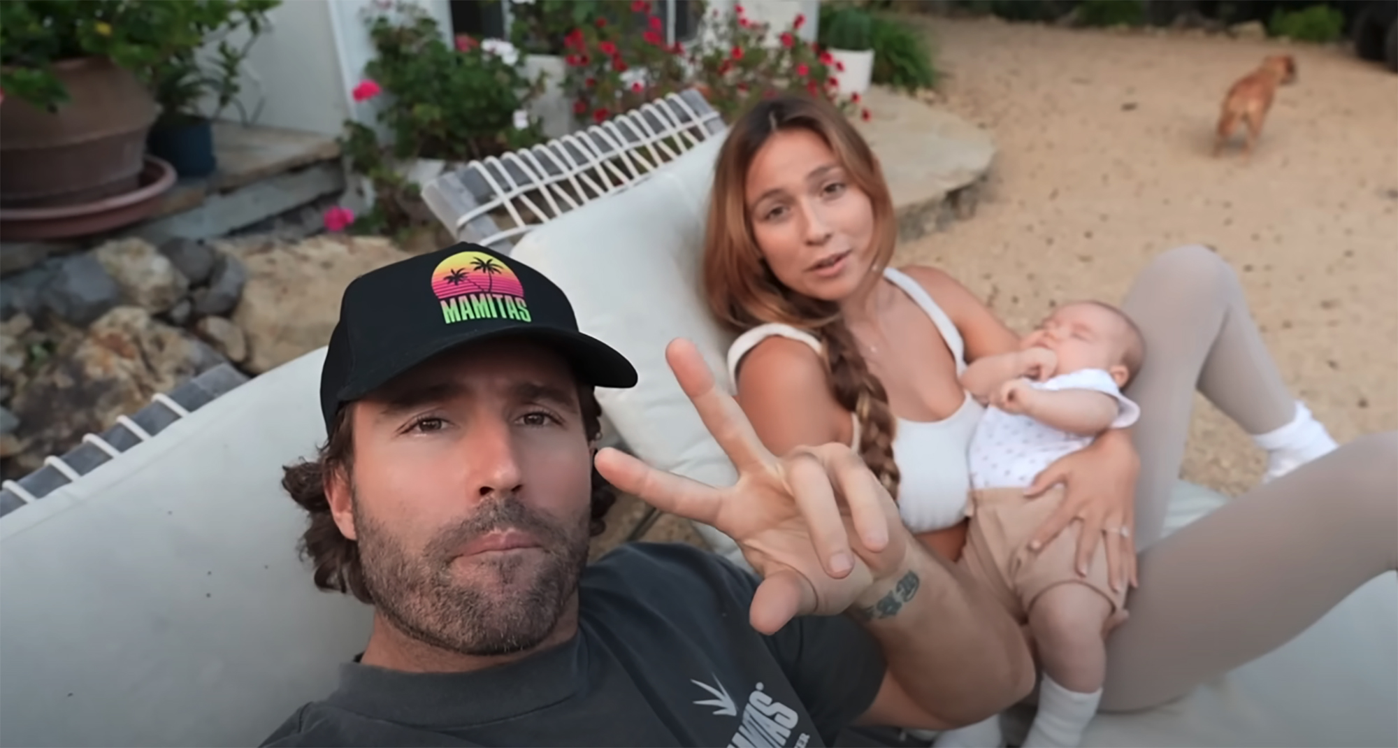 Brody Jenner, his fiancée, and their baby relaxing outdoors.