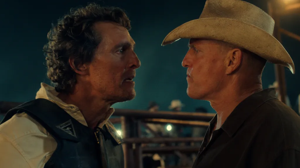 Matthew McConaughey and Woody Harrelson face each other in a scene from 
