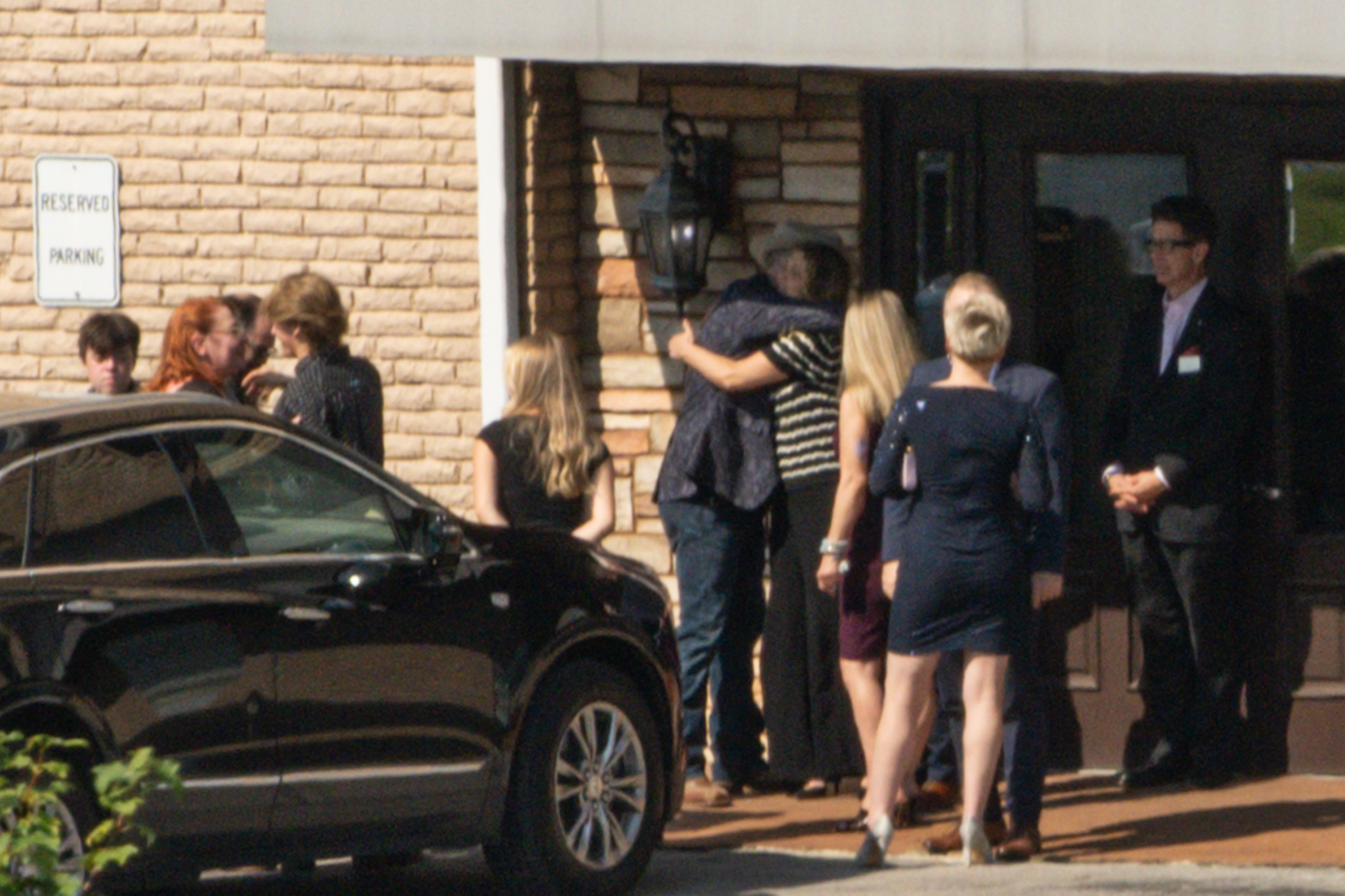 Bryan Seaver and Dolly Parton's family gather at the Woodlawn Funeral home.