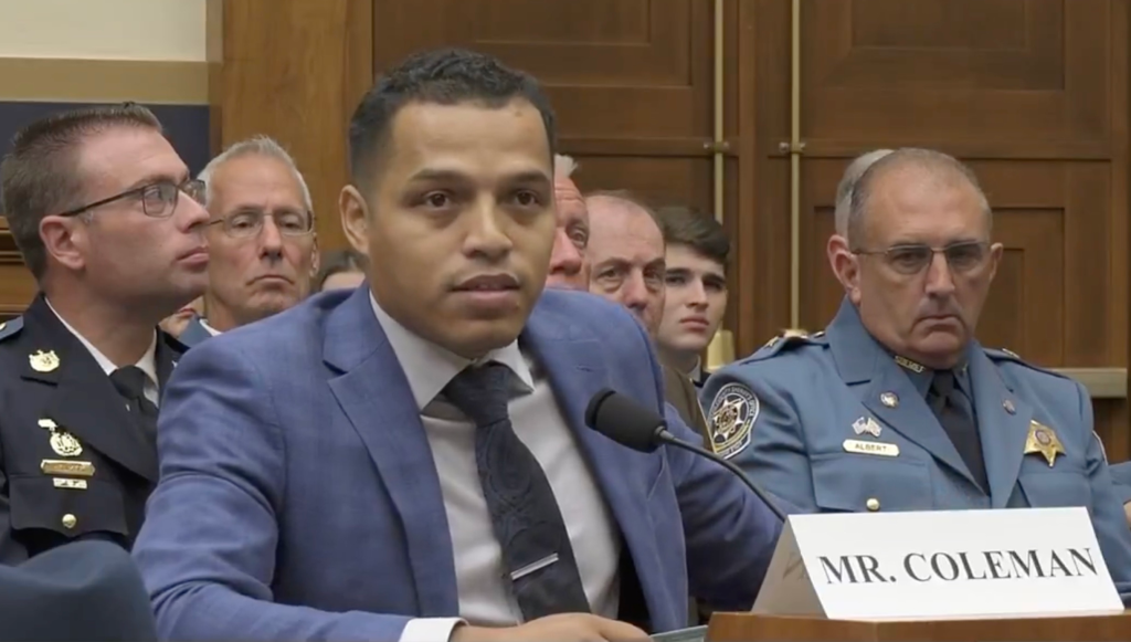 Marcus Coleman speaking at a hearing.