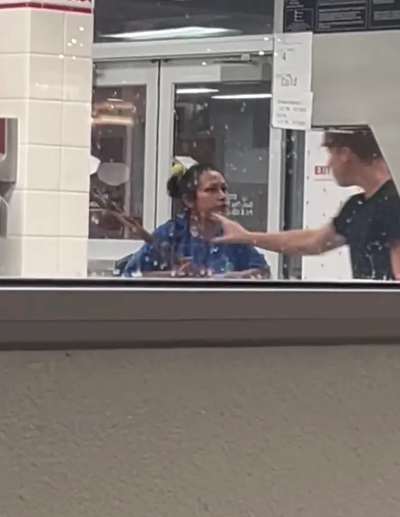 A person fighting off another person with a spatula at an In-N-Out.