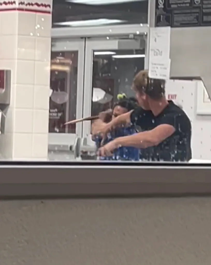 A person with broken wood confronts someone holding a spatula in an In-N-Out store.