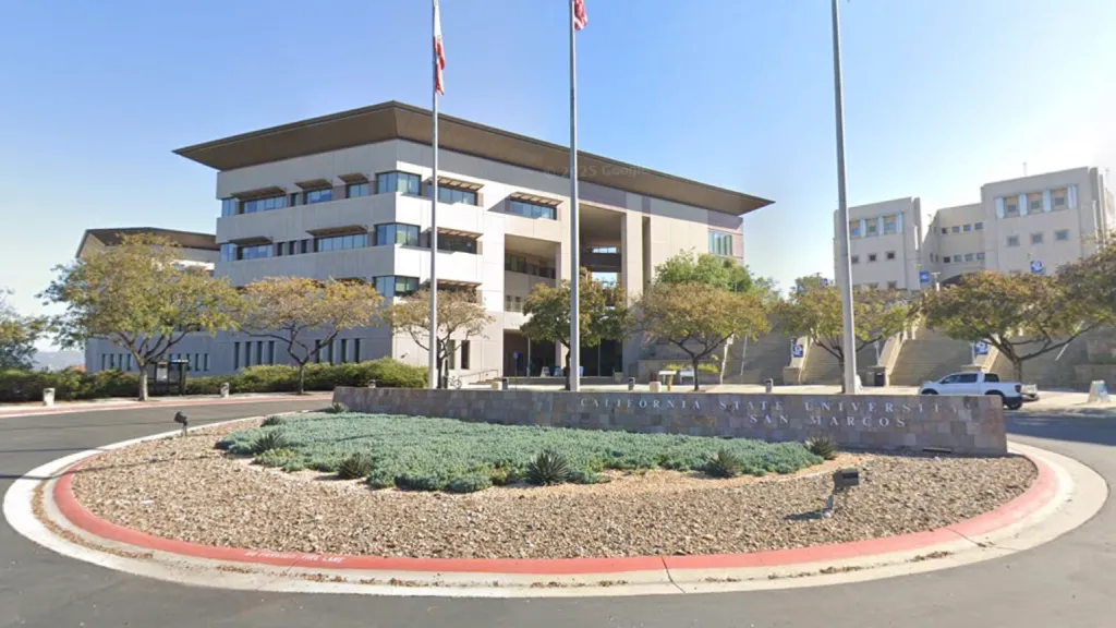 Entrance to California State University, San Marcos, with a circular drive and a stone sign.