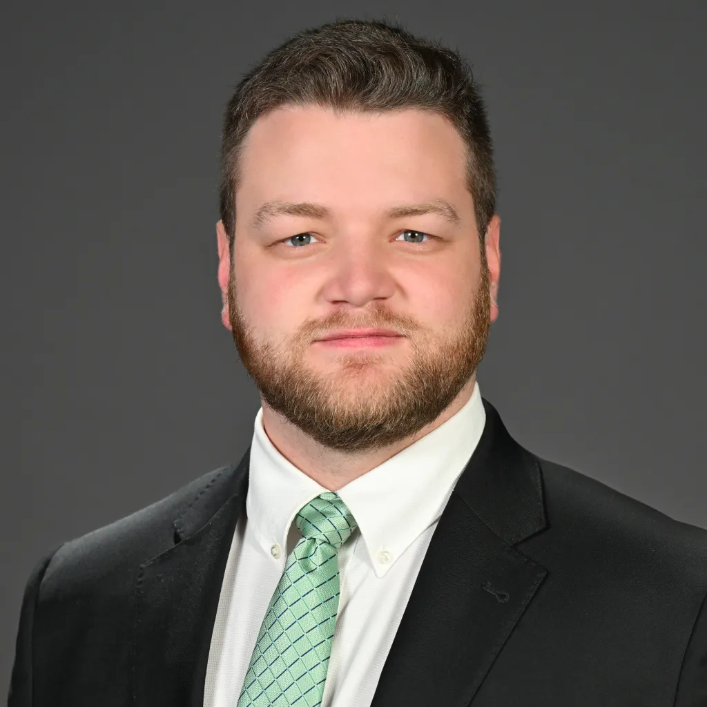 Headshot of Parker Thayer, an investigative researcher at Capital Research Center.