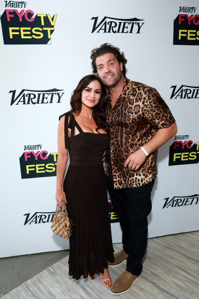 Catalina White and CT Tamburello pose together in front of a Variety FYC TV Fest backdrop.
