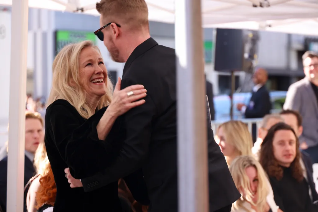 Catherine O'Hara embracing Macaulay Culkin.