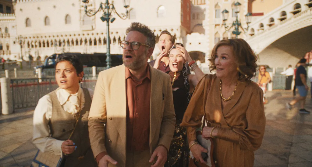 Catherine O'Hara, Seth Rogen, and other actors portraying surprised tourists in a European city.