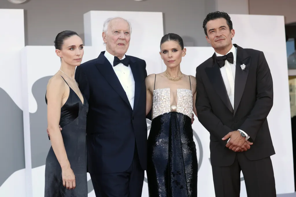 Rooney Mara, Werner Herzog, Kate Mara, and Orlando Bloom posing together at the 