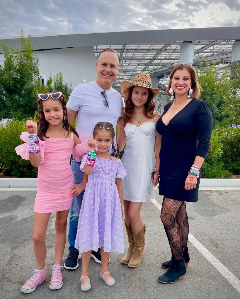 Chad Lowe and his wife and daughters Mabel, Fiona, and Nixie pose outside.