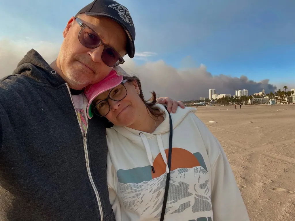 Chad Lowe and wife Kim on the beach.