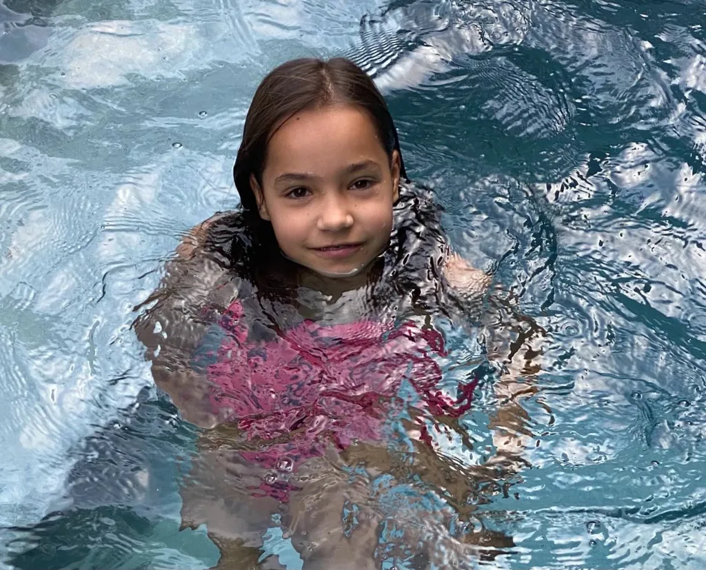 Fiona swimming in a pool.