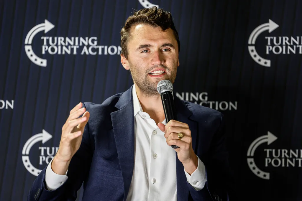 Charlie Kirk speaking at a Turning Point Action town hall meeting.