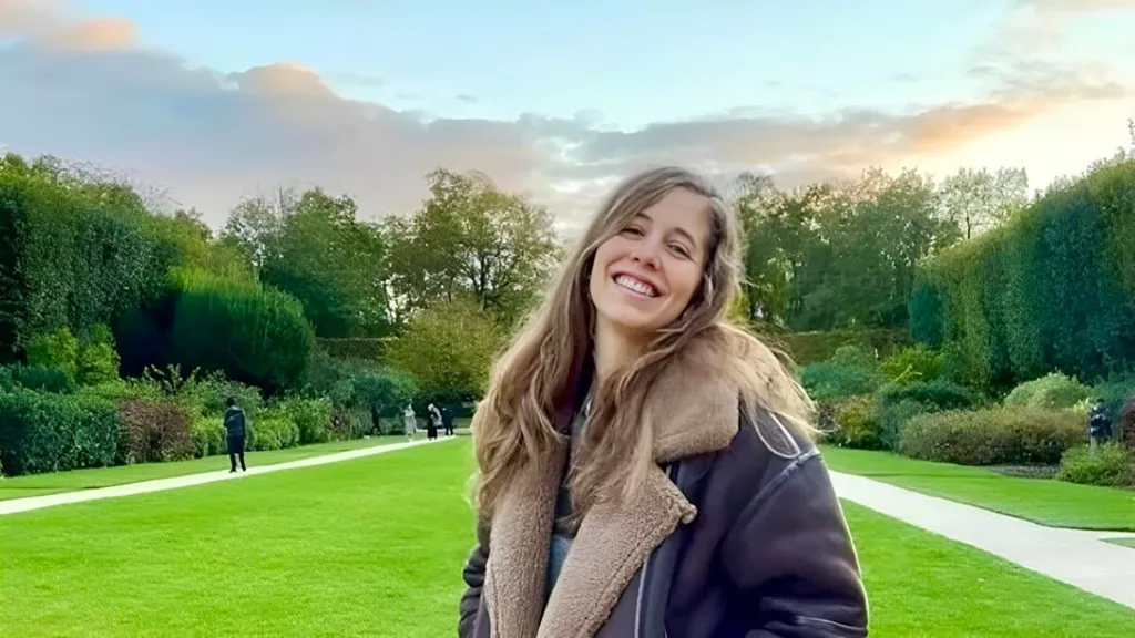Chiara Jaconis smiles at the camera in a park setting.