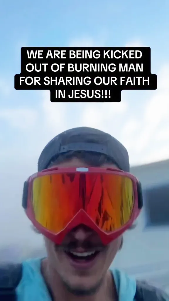 A person in ski goggles and a hat smiles, with a text overlay stating: