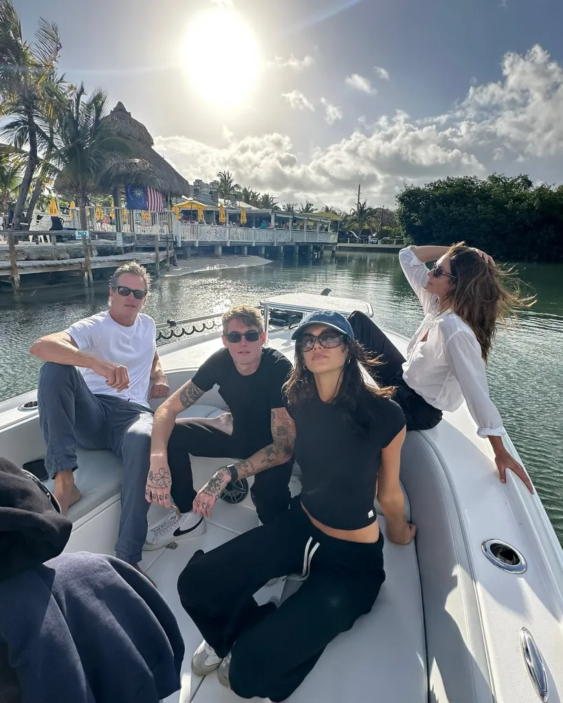 Cindy Crawford, Randy, Presley, and Kaia Gerber on a boat.