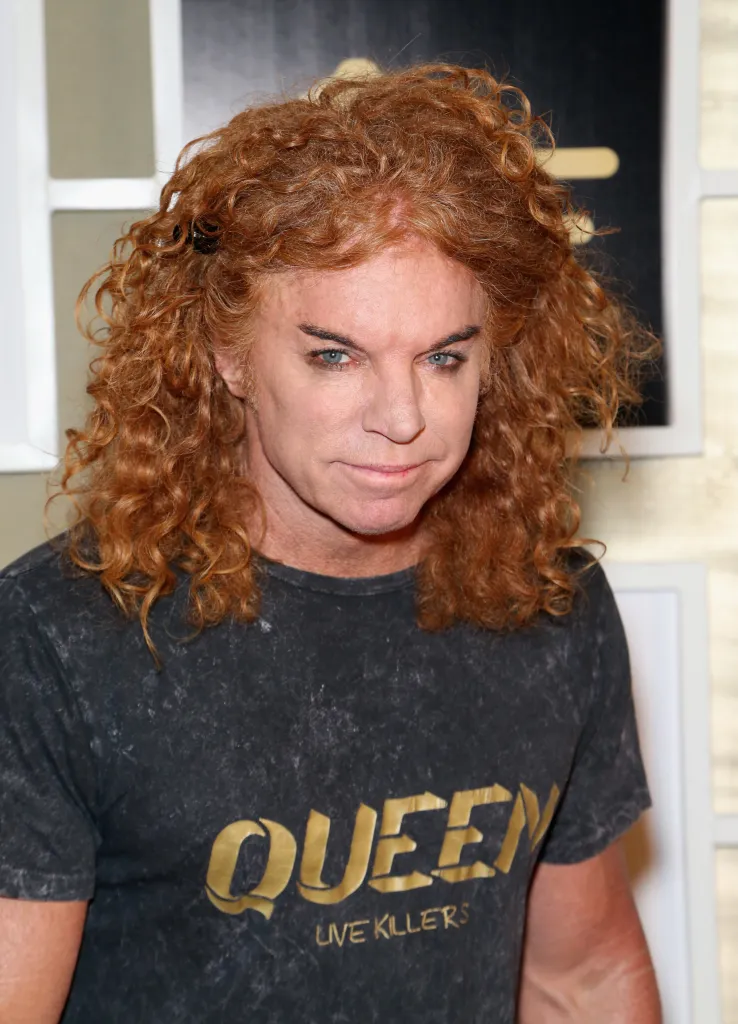 Comedian Carrot Top wearing a Queen band t-shirt.