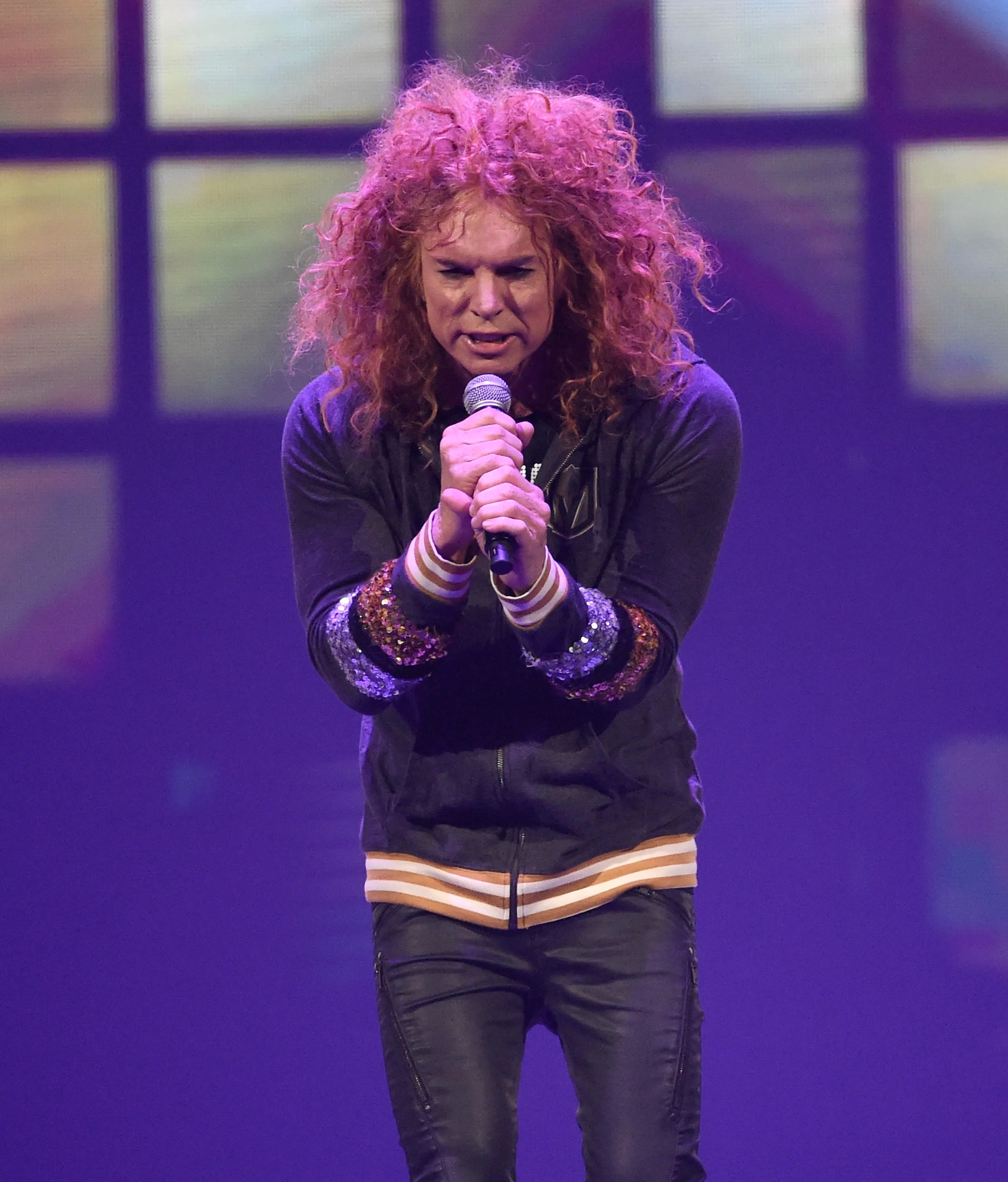 Comedian Carrot Top performing on stage.
