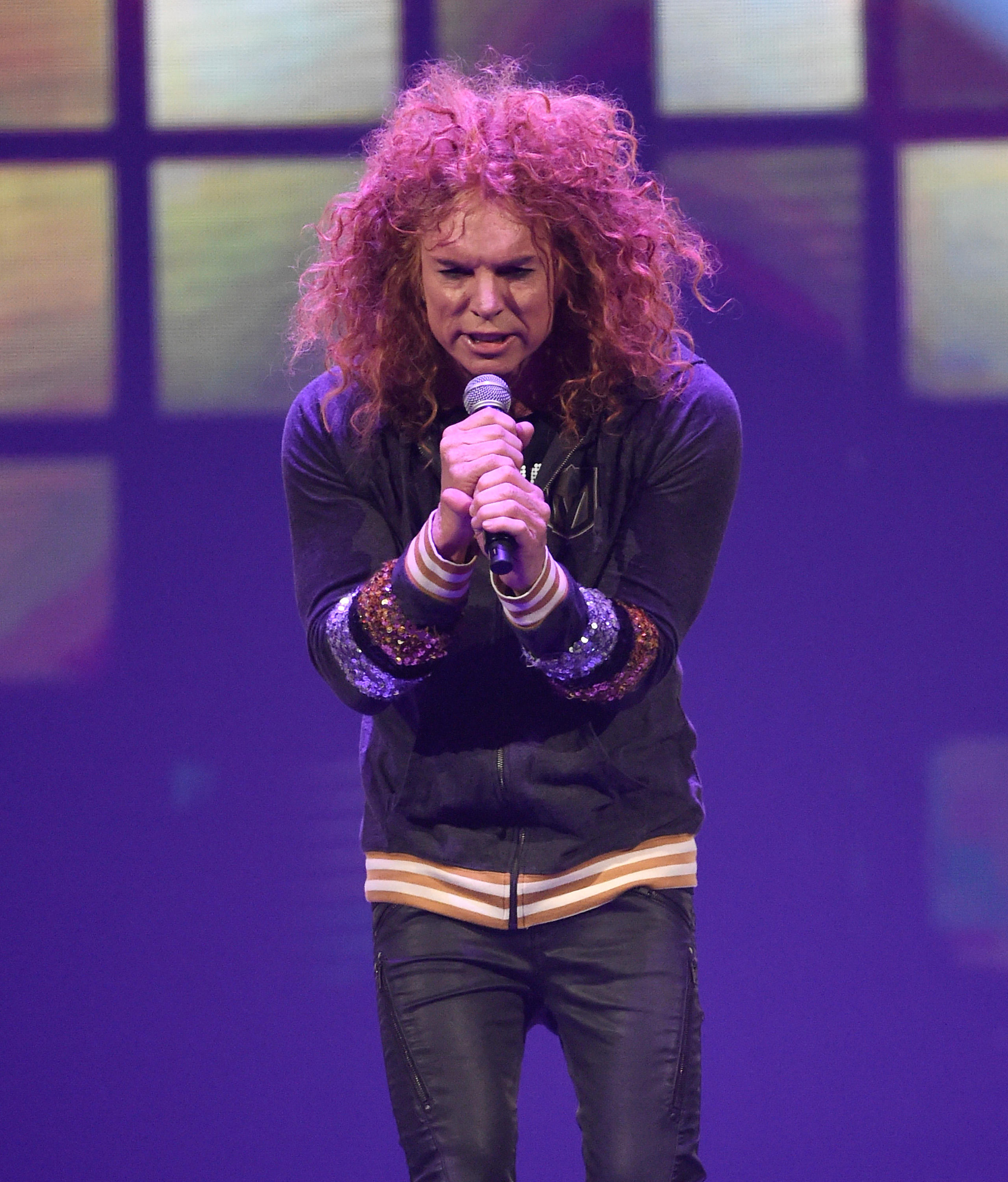 Comedian Carrot Top performs at the Vegas Strong Benefit Concert at T-Mobile Arena to support victims of the October 1 tragedy on the Las Vegas Strip on December 1, 2017 in Las Vegas, Nevada.