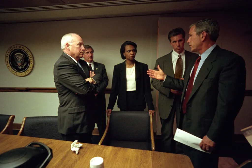 President George W. Bush meets with Vice President Dick Cheney, Chief of Staff Andy Card, National Security Adviser Condoleezza Rice, and Secret Service Special Agent Carl Truscott in the Presidential Emergency Operations Center.