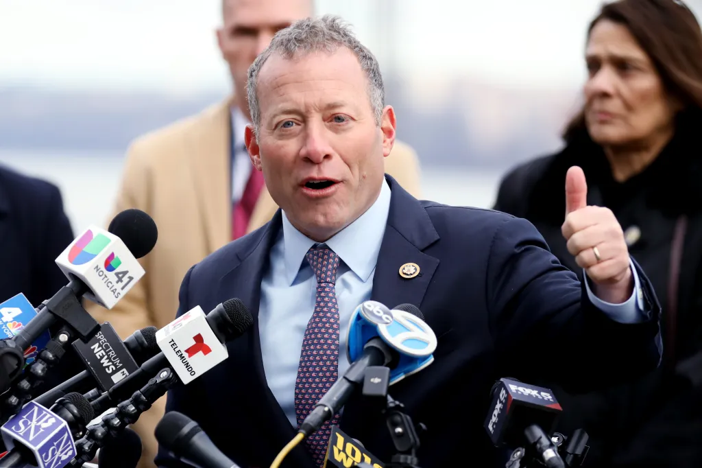 Congressman Josh Gottheimer speaks to the media at a press conference.