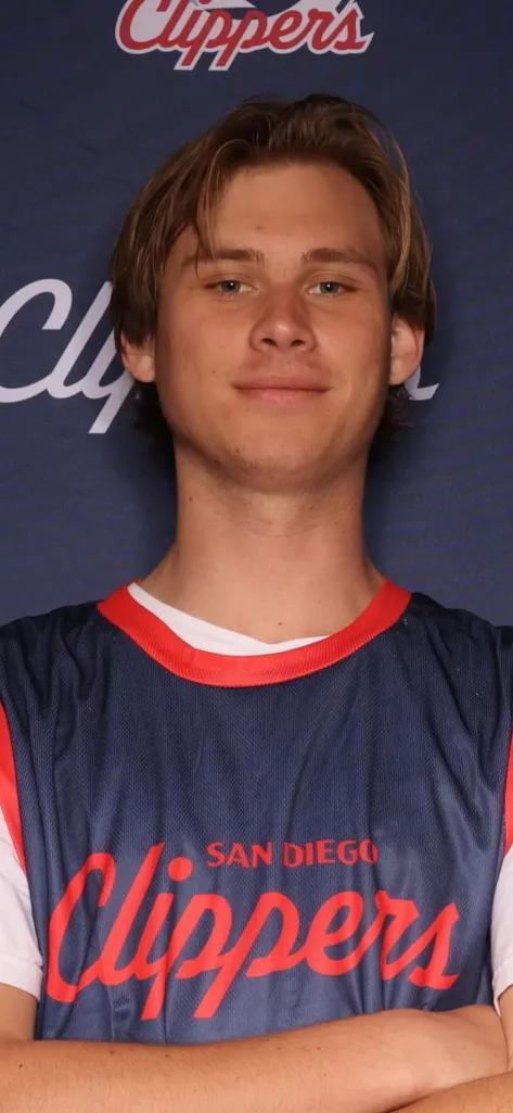 Cooper Vincik, a senior at Chapman University, smiles at the camera.