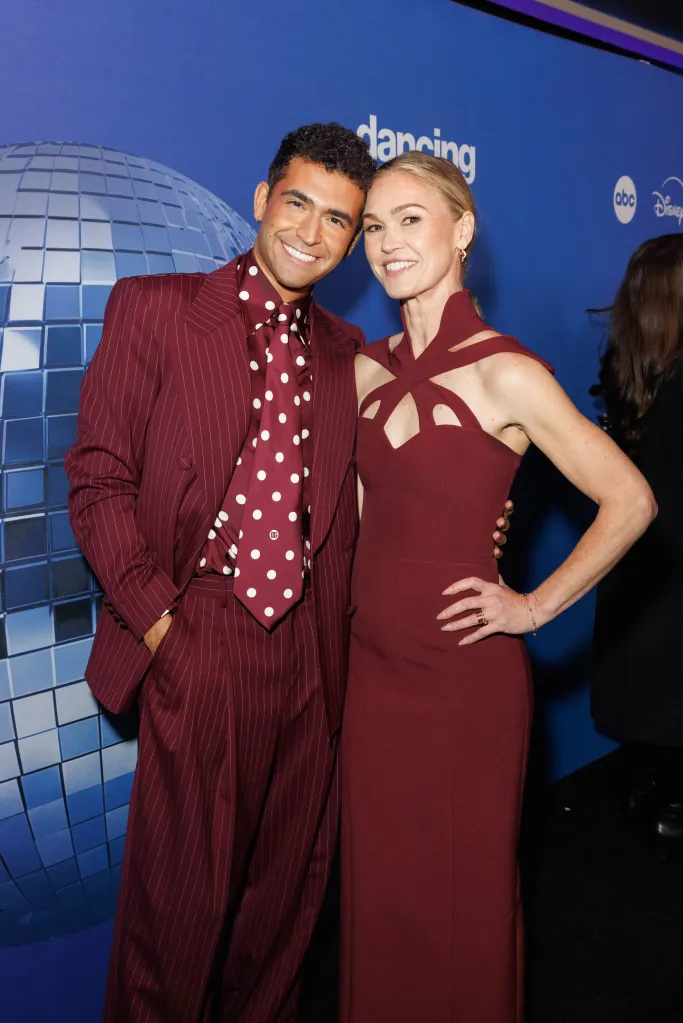 Ezra Sosa and Julia Stiles smiling at the 