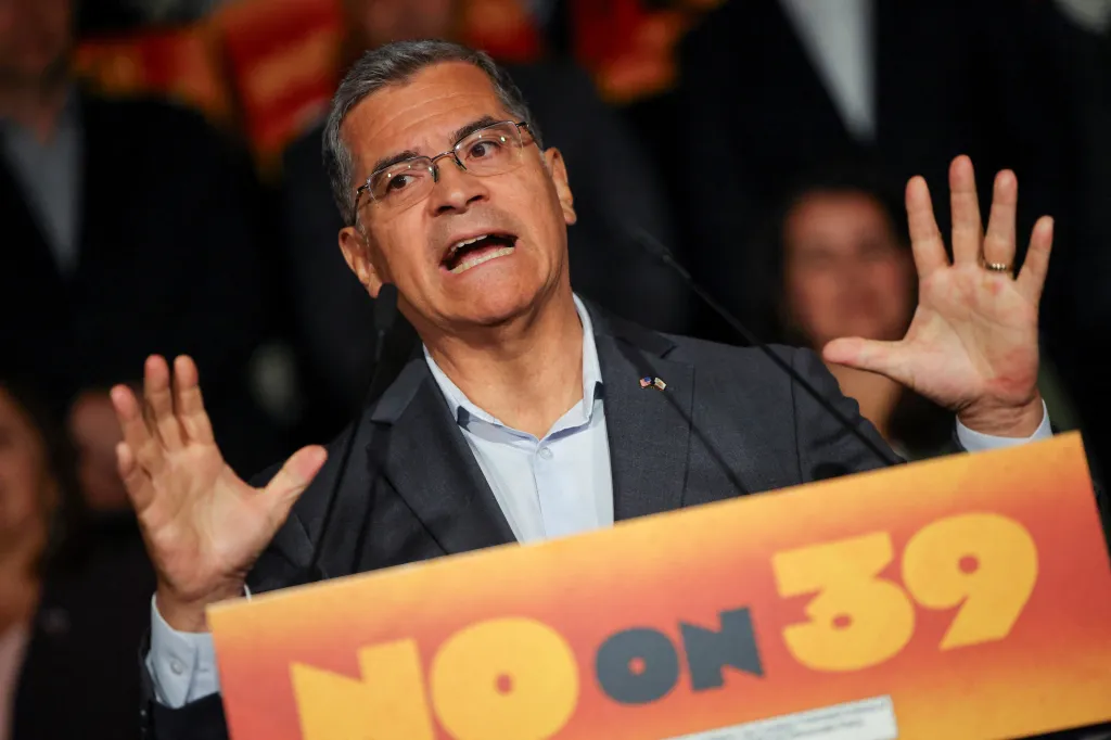 Democratic candidate Xavier Becerra speaks at a news conference opposing Proposition 39.