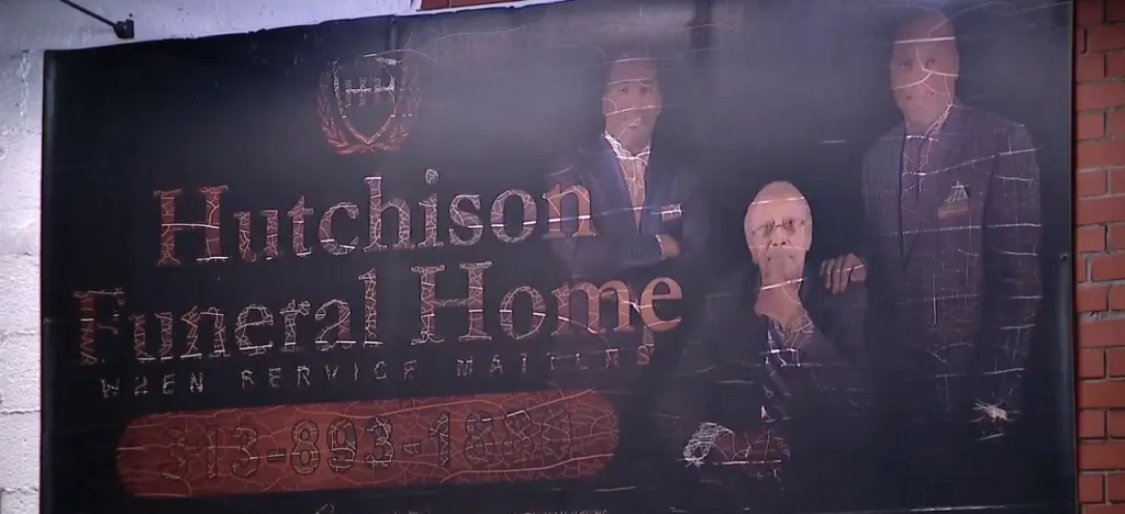 A sign for Hutchison Funeral Home with the text 