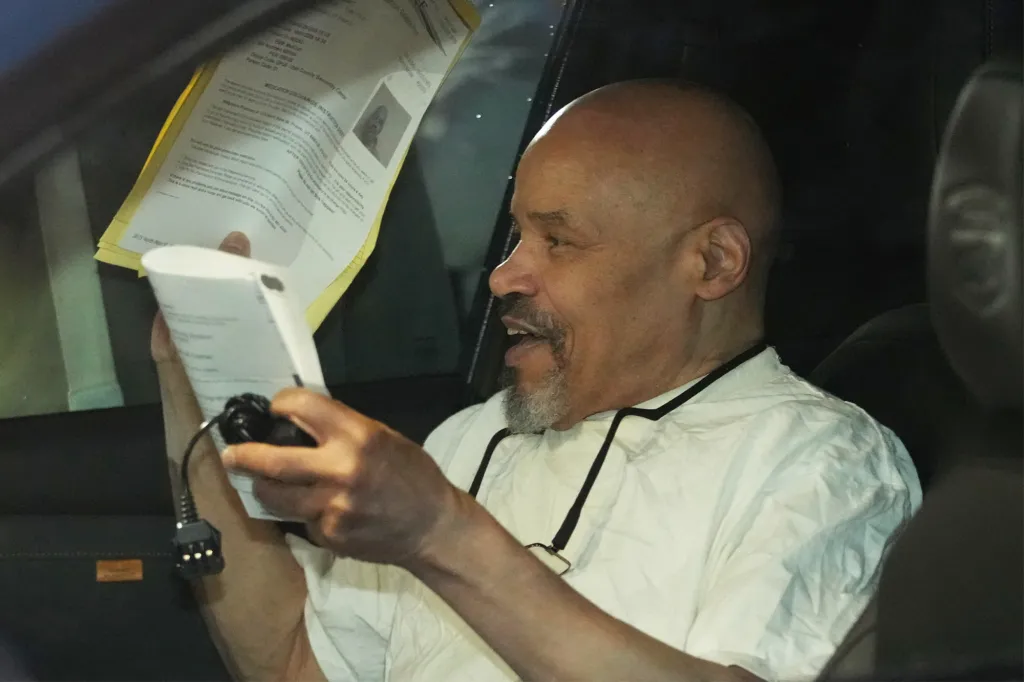 Douglas Stewart Carter sits in a car after he was released from the Utah County Jail as a Utah judge ordered his release on Sept. 28, 2026, in Spanish Fork, Utah.