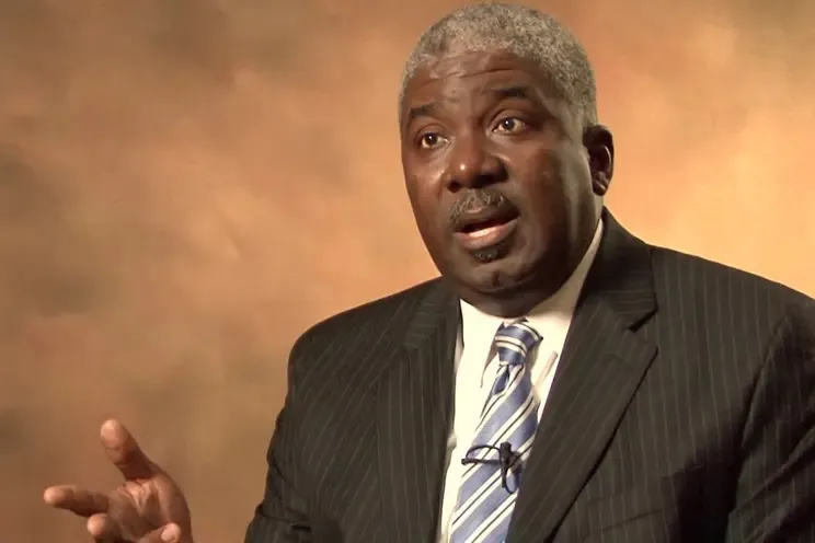 Dr. Christian Sanon, an evangelical pastor, speaking.