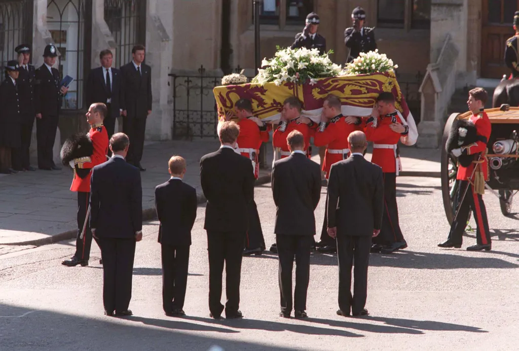 The Duke of Edinburgh, Prince William, Earl Spencer, Prince Harry and the Prince of Wales following the coffin of Diana, Princess of Wales at her funeral.