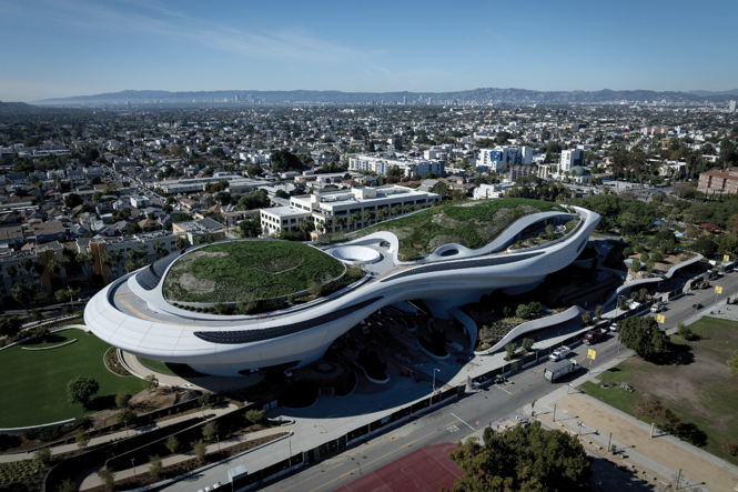 aerial photo of Lucas Museum complex and grounds with city and mountains in background