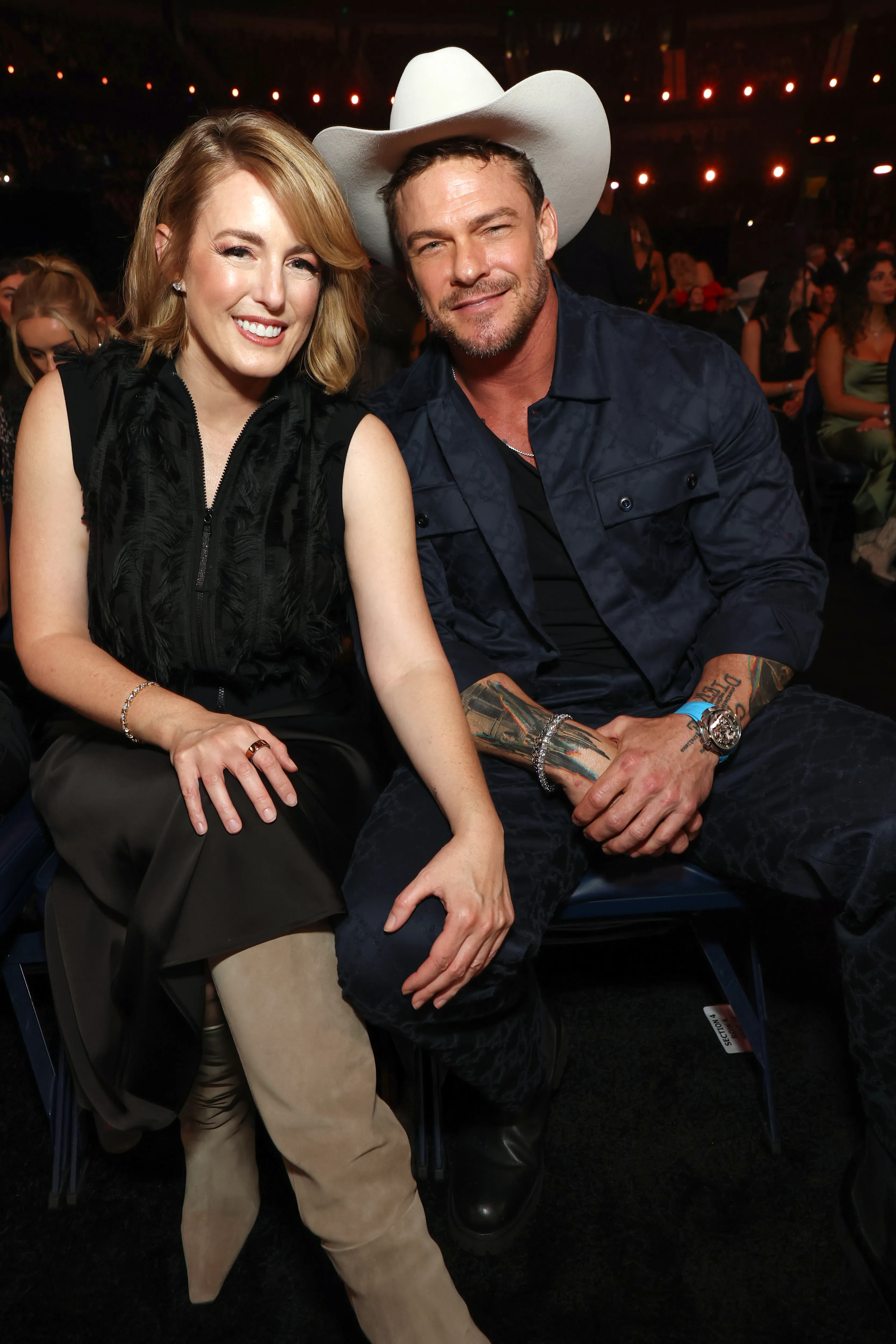 Catherine Ritchson and Alan Ritchson attend the 59th Annual Country Music Association Awards.