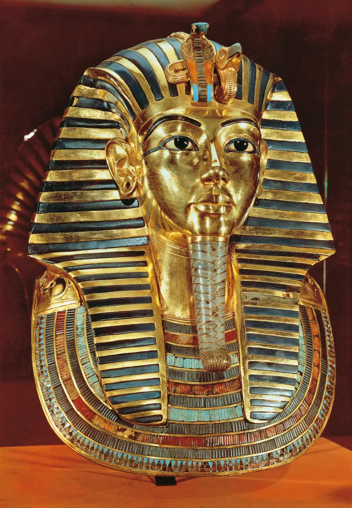 The gold burial mask of Pharaoh Tutankhamen.