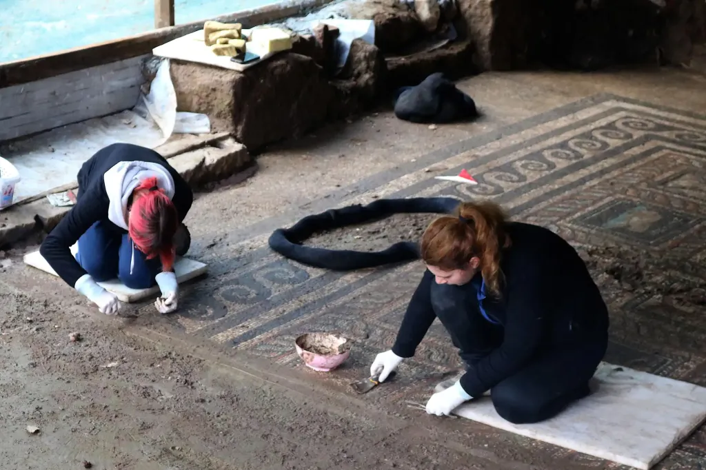 An elaborate mosaic artwork features a dog named Ocean and a cat named Emerald. A wealthy Roman man who lived nearly 2,000 years ago seemingly commissioned the mosaic honoring his beloved dog and cat.