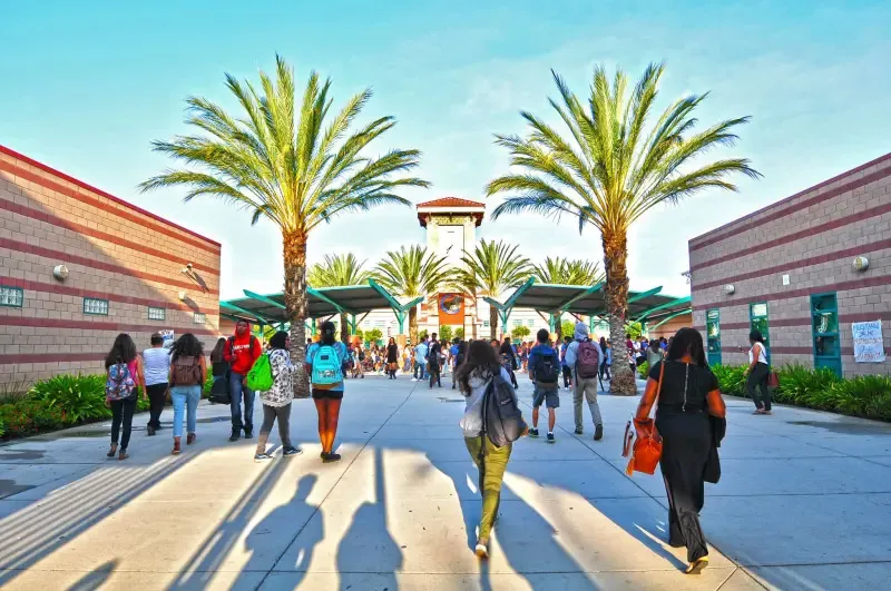 Students walking on the Eleanor Roosevelt High School campus.