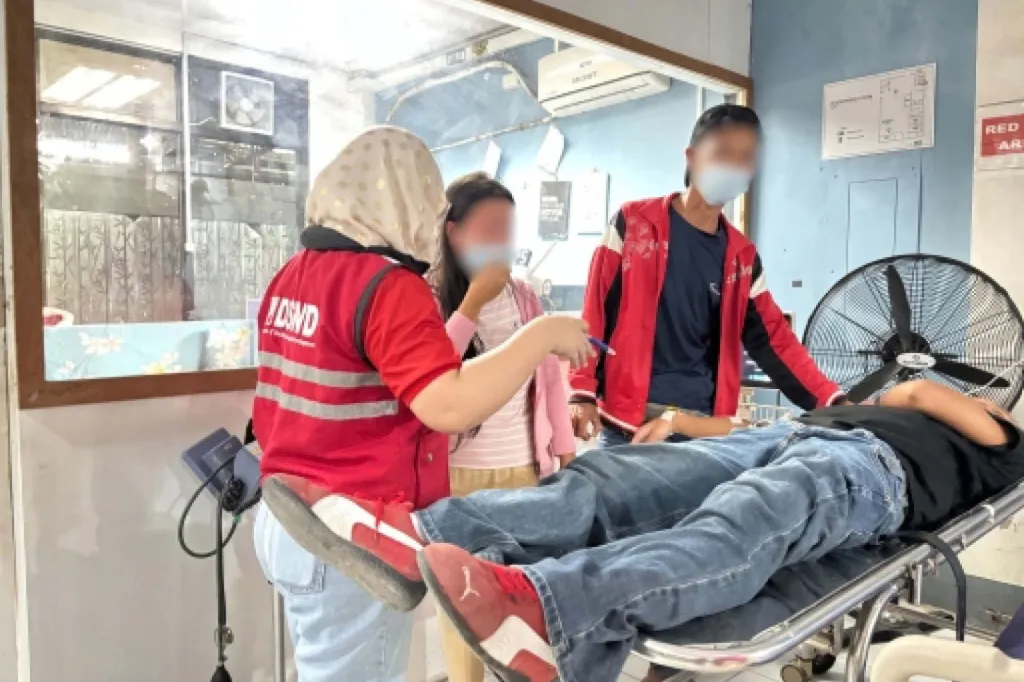 Emergency services personnel help injured students after a deadly shooting at a school in Banga, South Cotabato, Philippines, on Sept. 18, 2026.