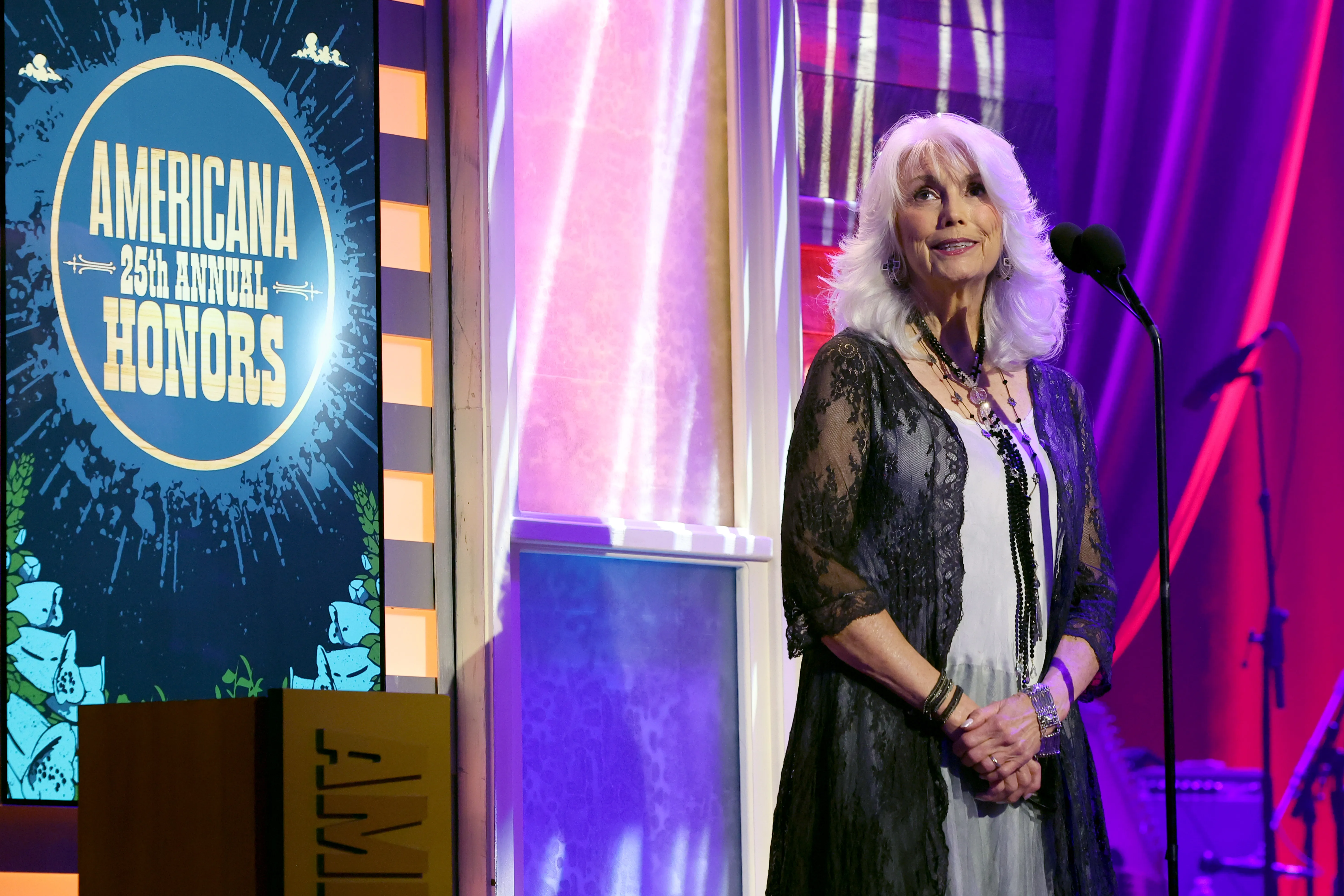Emmylou Harris speaking on stage at the 25th Annual Americana Honors & Awards.