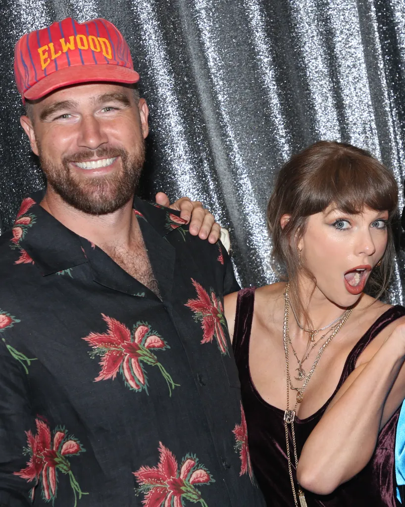 Travis Kelce and Taylor Swift backstage at 