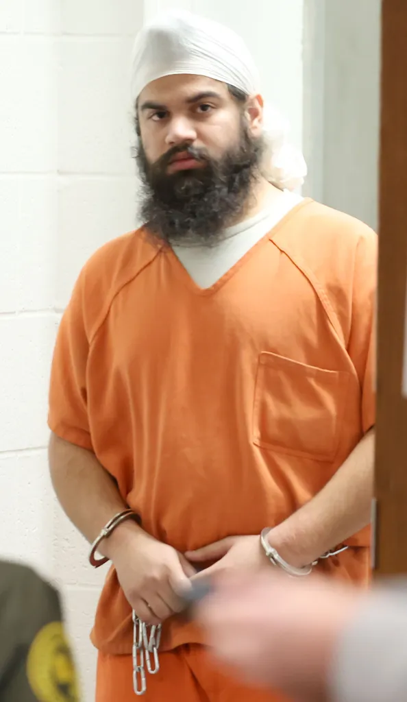 Marcus Coleman speaking at a hearing.
