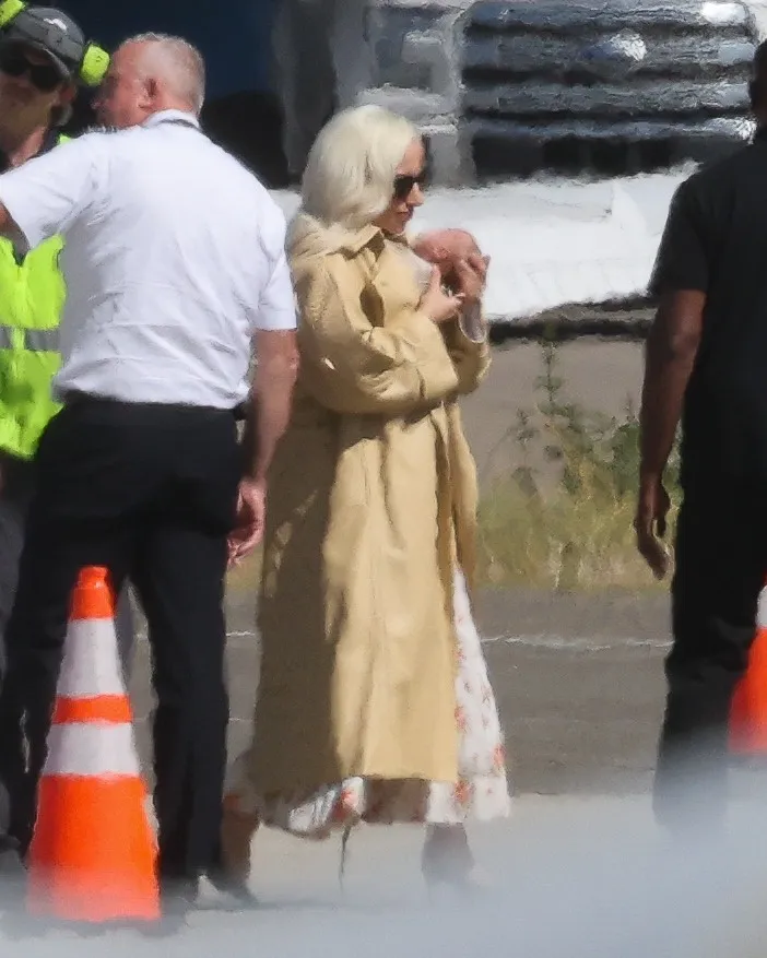 Lady Gaga arriving in Los Angeles with her newborn daughter.